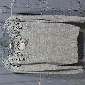 Sweater with flower detail at top
